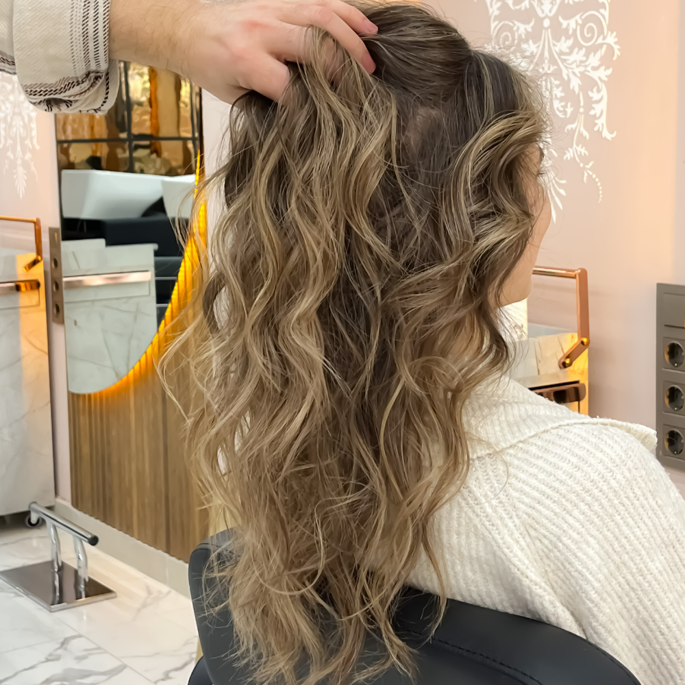 Woman with wavy, long hair